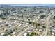 Aerial view of a residential area with waterfront access and neatly arranged homes and streets at 330 Lasayette Ne Dr, Port Charlotte, FL 33952