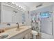 Charming bathroom featuring beach decor and shower with sliding glass door at 330 Lasayette Ne Dr, Port Charlotte, FL 33952