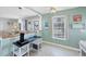 Bright dining area next to the kitchen with lots of light from a large window at 330 Lasayette Ne Dr, Port Charlotte, FL 33952