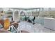 Bright Florida room with tiled floors, comfortable seating, and backyard view at 330 Lasayette Ne Dr, Port Charlotte, FL 33952
