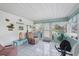 Charming Florida room with tiled floors and plenty of natural light and access to the outside at 330 Lasayette Ne Dr, Port Charlotte, FL 33952