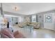 Inviting living room with an open layout to the dining area at 330 Lasayette Ne Dr, Port Charlotte, FL 33952