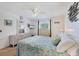 The main bedroom featuring coastal decor, dresser, and calming colors at 330 Lasayette Ne Dr, Port Charlotte, FL 33952