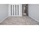 Spacious room offers closet and luxury vinyl plank flooring at 3380 Elkcam Blvd, Port Charlotte, FL 33952