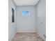 Clean utility room featuring luxury vinyl plank flooring and laundry hookups at 3380 Elkcam Blvd, Port Charlotte, FL 33952