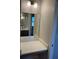Bathroom vanity with quartz counter and mirror at 3560 Elias Cir, North Port, FL 34288