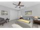 Comfortable bedroom featuring a soft bed, neutral decor, and ample closet space at 3560 Elias Cir, North Port, FL 34288