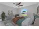 Bright bedroom with a view, neutral colors, and contemporary furnishings for a peaceful retreat at 3560 Elias Cir, North Port, FL 34288