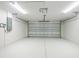 This garage has an electric garage door and electric panel at 3560 Elias Cir, North Port, FL 34288