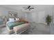 Bright primary bedroom features neutral walls, and large windows for natural light at 3560 Elias Cir, North Port, FL 34288