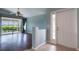 Open living space with lanai access, perfect for enjoying indoor-outdoor living at 3702 Lakewood Blvd, North Port, FL 34287
