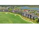 Scenic aerial view showcases the condo's proximity to the golf course and lake at 43030 Greenway Blvd # 426, Punta Gorda, FL 33982