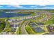 Luxury amenities including tennis courts, golf course and lake at 43030 Greenway Blvd # 426, Punta Gorda, FL 33982