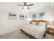 Calm bedroom with neutral colors, comfortable king-size bed, and ample natural light at 43030 Greenway Blvd # 426, Punta Gorda, FL 33982