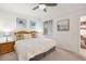 Inviting bedroom features a plush bed, soft carpet, and a bedside table with a lamp at 43030 Greenway Blvd # 426, Punta Gorda, FL 33982