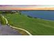 Gorgeous evening aerial view of golf course and lake view behind condo at 43030 Greenway Blvd # 426, Punta Gorda, FL 33982