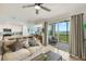 Bright living room with seamless access to a screened patio with lake views at 43030 Greenway Blvd # 426, Punta Gorda, FL 33982