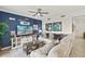 Charming living room with a nautical theme, a large comfy couch, and a flat-screen television at 43030 Greenway Blvd # 426, Punta Gorda, FL 33982
