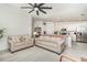 Open-concept living room flowing into the kitchen and breakfast bar area at 43984 Boardwalk Loop # 1726, Punta Gorda, FL 33982