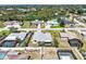 Aerial view of home with landscaped yard and proximity to other houses and pools in neighborhood at 5331 Citadel Rd, Venice, FL 34293