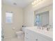 Bathroom with a white vanity and a shower featuring a colorful curtain with a sea life pattern at 5331 Citadel Rd, Venice, FL 34293