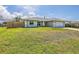Well-maintained home featuring a lush green lawn and privacy fence at 5331 Citadel Rd, Venice, FL 34293