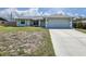 Charming single-story home with a well-manicured lawn and a two-car garage at 5331 Citadel Rd, Venice, FL 34293