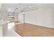 Open living space with tile and wood-look floors, with natural light at 5331 Citadel Rd, Venice, FL 34293