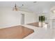 Bright and open living space with tile floors and a sliding glass door at 5331 Citadel Rd, Venice, FL 34293