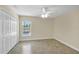 Bright bedroom with closet and a view of the pool at 8183 Deland St, Port Charlotte, FL 33981