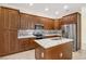 Modern kitchen with stainless steel appliances, marble countertops, and custom cabinetry, designed for functionality and style at 8183 Deland St, Port Charlotte, FL 33981