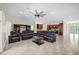Spacious open-concept living area with modern furnishings and ample natural light, ideal for Gathering gatherings at 8183 Deland St, Port Charlotte, FL 33981