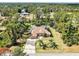 Beautiful single Gathering home featuring a tile roof, solar panels, a screened pool, and a brick paved driveway at 8377 Mambo Ave, North Port, FL 34291