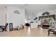 Bright living area with tile floors, and abundant light from large windows, offers a spacious feel at 8377 Mambo Ave, North Port, FL 34291