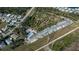 Aerial view showing the homes and community services available to residents at 857 Seabrooke Dr, Englewood, FL 34223