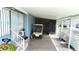 Convenient carport with a golf cart, providing shaded parking and storage space at 857 Seabrooke Dr, Englewood, FL 34223