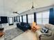 Inviting living room features ample natural light and comfortable seating arrangements at 857 Seabrooke Dr, Englewood, FL 34223
