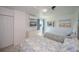 Bright bedroom with two twin beds and beach-themed decor at 900 Stewart St, Englewood, FL 34223