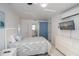 Bright bedroom with a queen bed and beach-themed decor at 900 Stewart St, Englewood, FL 34223