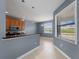 Eat-in kitchen featuring pendant lighting, black counters, and stainless steel appliances at 97 Pine Valley Ln, Rotonda West, FL 33947