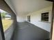 Screened patio area, perfect for enjoying the outdoors while remaining protected from the elements at 10112 Willmington Blvd, Englewood, FL 34224