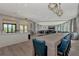 Expansive common area with dining and seating, ideal for events and entertaining at 11819 Sistine Ln, Venice, FL 34293