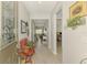 A welcoming entryway with decorative accents and a view into the living areas at 11819 Sistine Ln, Venice, FL 34293