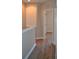 Upstairs hallway showing laminate floors and an alcove at 1271 Jonah Dr, North Port, FL 34289