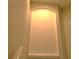Hallway with unique architectural details and natural lighting at 1271 Jonah Dr, North Port, FL 34289