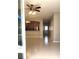 View from screened porch into a spacious living area and kitchen at 1271 Jonah Dr, North Port, FL 34289