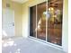 Covered outdoor patio with sliding glass doors at 1271 Jonah Dr, North Port, FL 34289