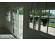 Sunroom with sliding glass doors and windows, offering a view of the outdoor space at 1480 Wise Dr, North Port, FL 34286