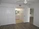 Bedroom showcasing closets and a bathroom at 150 Harborside Ave # 124, Punta Gorda, FL 33950