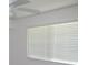 Natural light illuminates this room through a window with adjustable blinds at 150 Harborside Ave # 124, Punta Gorda, FL 33950